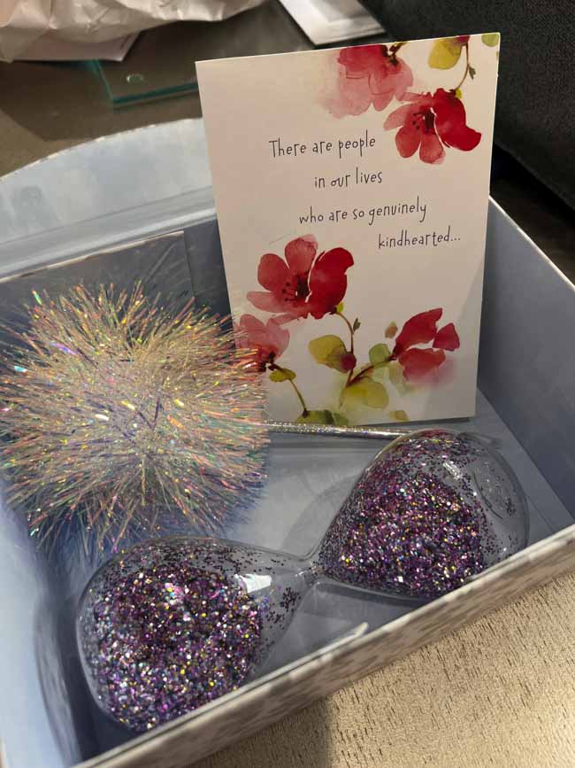 A gift box with a greeting card