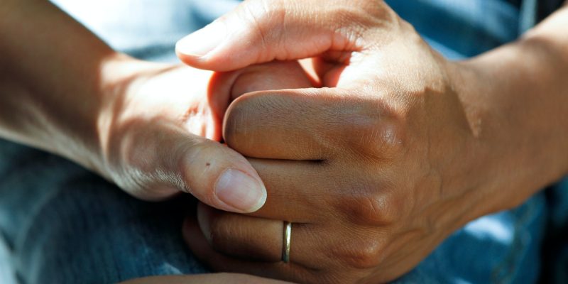 a picture of two hands holding